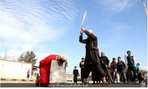 ISIS terror group beheads a man for insulting Allah